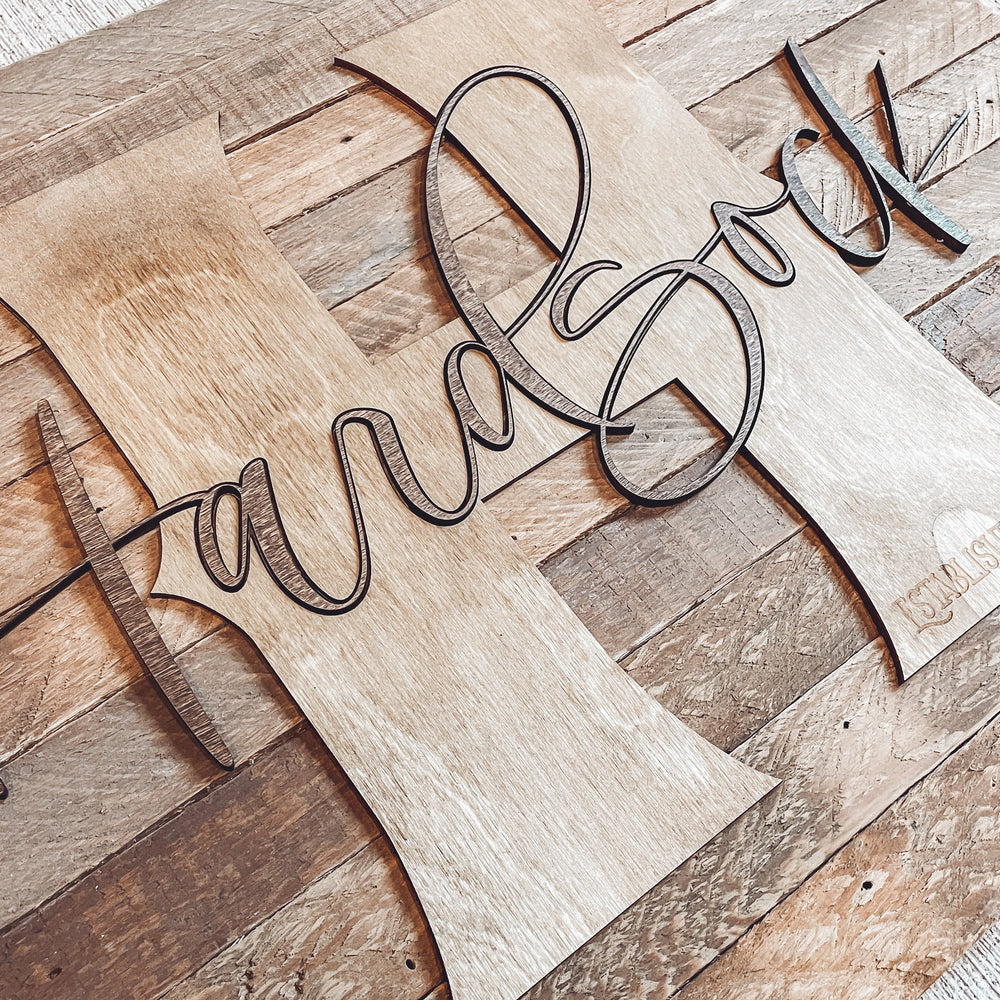 Monogrammed Family Name Sign on Farmhouse Lath